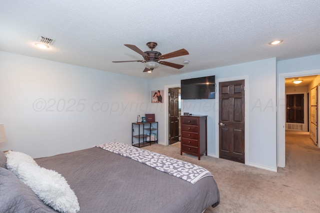 bedroom featuring light carpet, a ceiling fan, a textured ceiling, baseboards, and recessed lighting