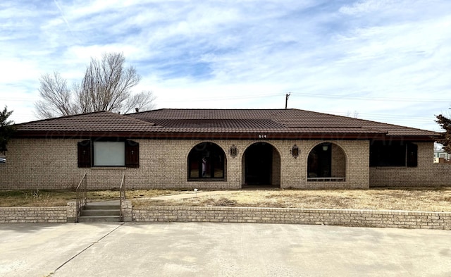 view of front of home with a patio area