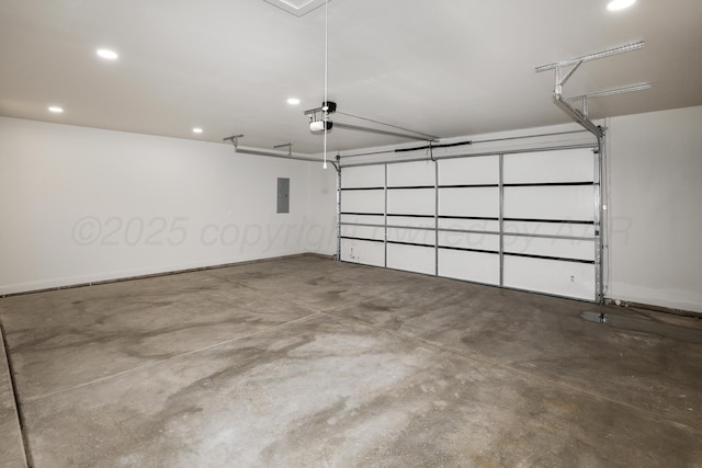 garage featuring a garage door opener and electric panel