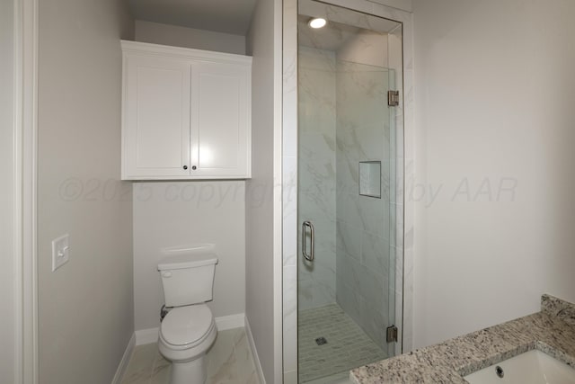 bathroom featuring vanity, toilet, and walk in shower