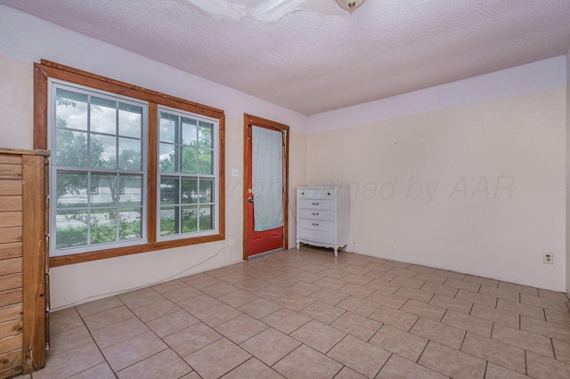 102 S Sumner St, Pampa, TX 79065 - empty room with a textured ceiling
