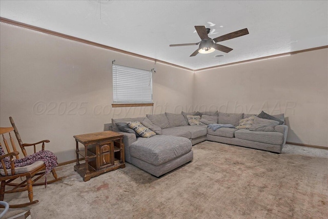 living room featuring carpet flooring, a ceiling fan, and baseboards