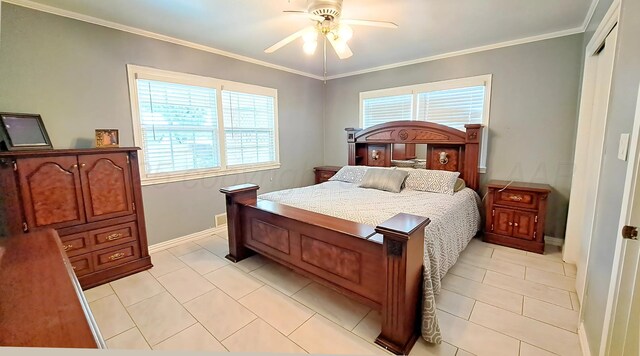 907 Cherry Ave, Dalhart, TX 79022 - bedroom featuring light tile patterned flooring, crown molding, baseboards, and a ceiling fan