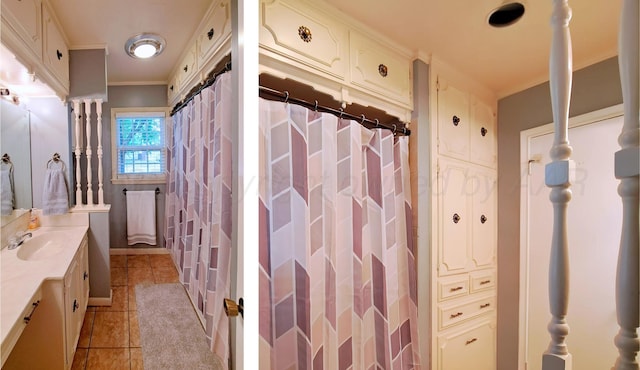 907 Cherry Ave, Dalhart, TX 79022 - bathroom with vanity, tile patterned flooring, and crown molding