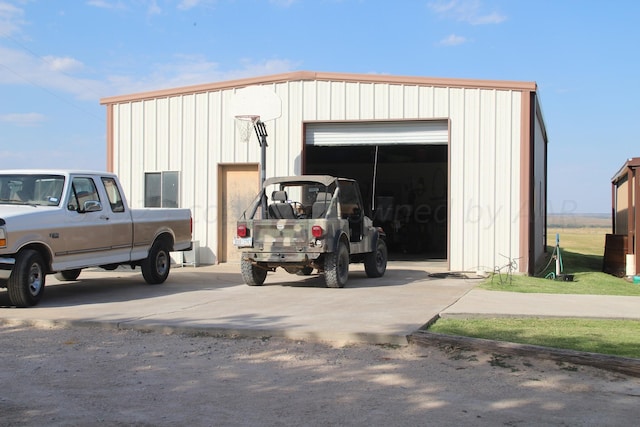 view of outbuilding with a garage