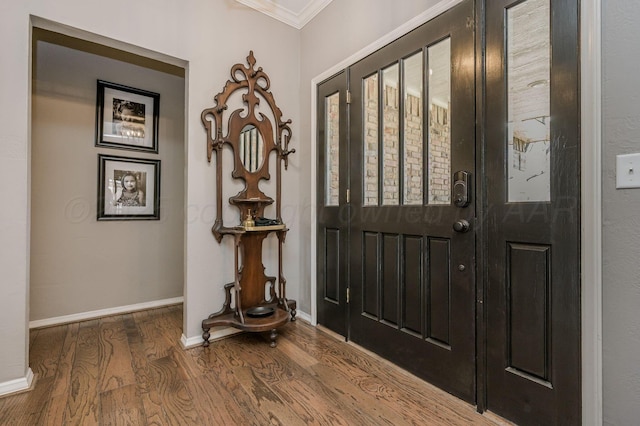 7826 Tarrytown Ave, Amarillo, TX 79121 - foyer entrance with baseboards, ornamental molding, and wood finished floors