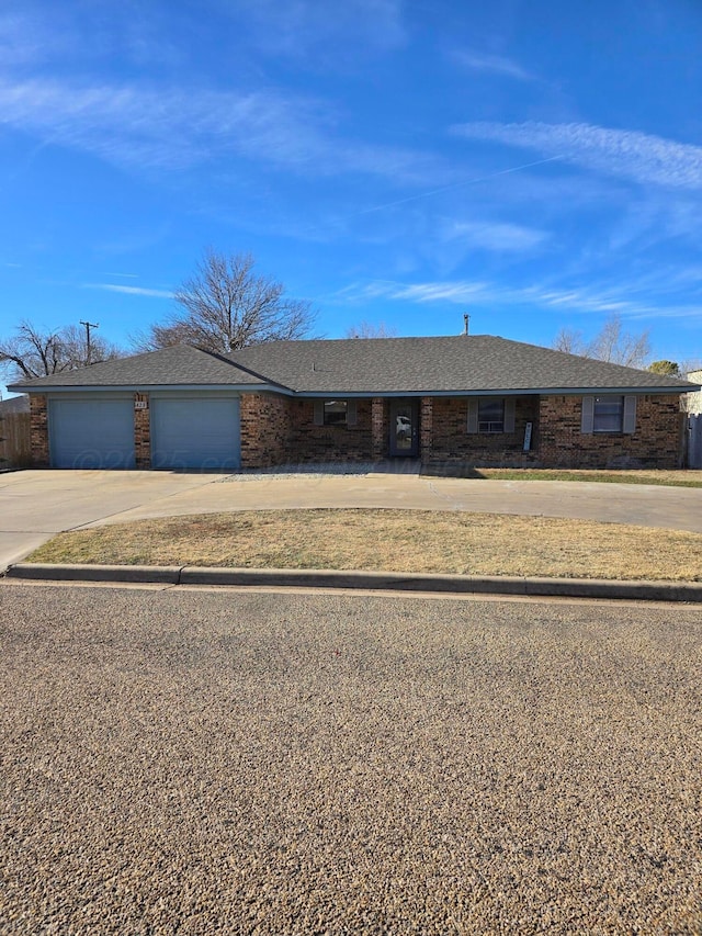 single story home with a garage