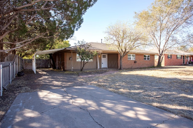 single story home with a carport