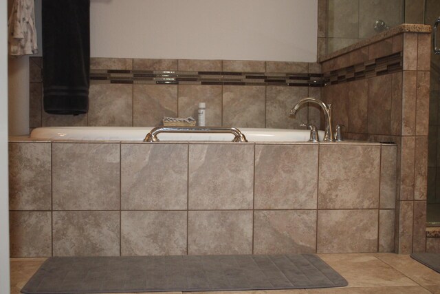 7717 Tripp Ave, Amarillo, TX 79121 - bathroom view of a garden tub and a tile shower