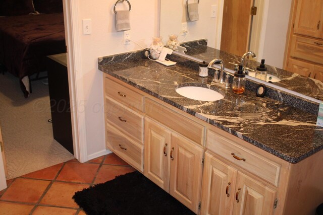 7717 Tripp Ave, Amarillo, TX 79121 - bathroom with vanity and tile patterned floors