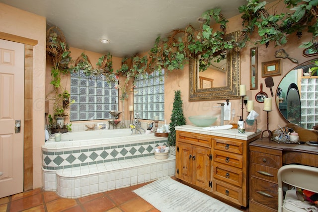 803 N Locust St, Wildorado, TX 79098 - full bathroom with a garden tub, vanity, and tile patterned flooring