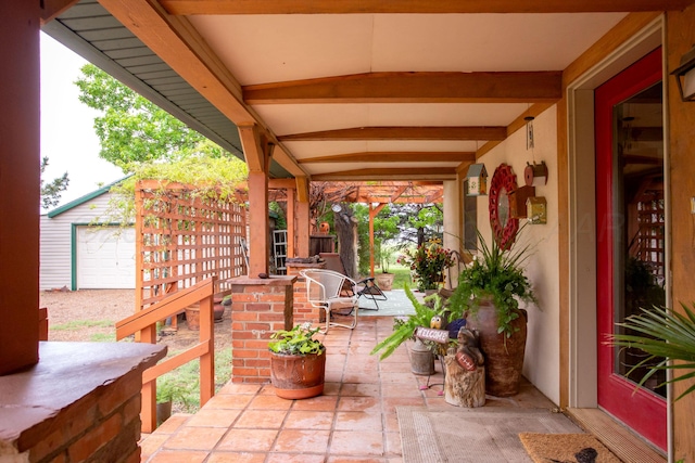 803 N Locust St, Wildorado, TX 79098 - view of patio featuring an outbuilding
