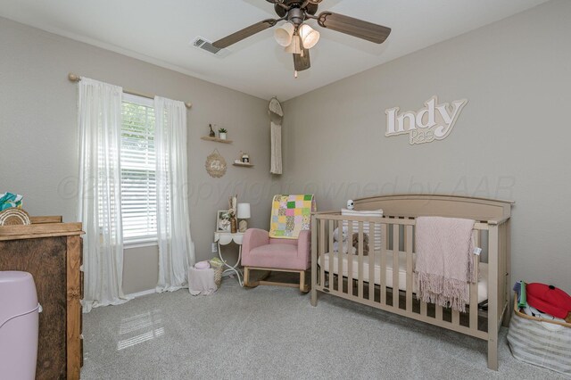 8508 Littlerock Dr, Amarillo, TX 79118 - bedroom featuring carpet, a nursery area, and ceiling fan