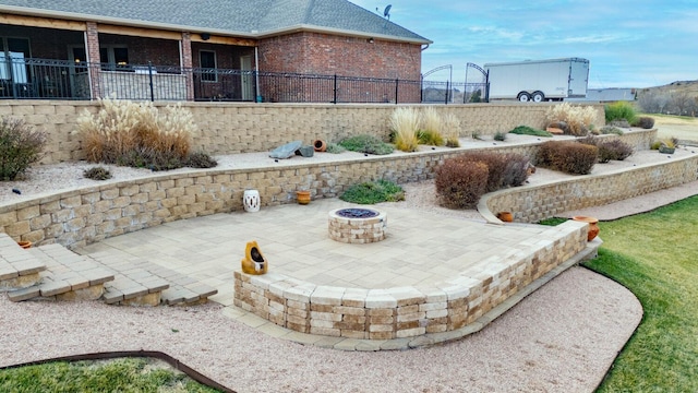 2501 Mackenzie Trl, Amarillo, TX 79124 - view of patio with a fire pit