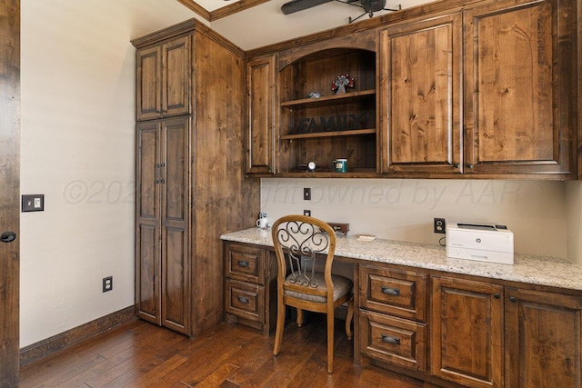 2501 Mackenzie Trl, Amarillo, TX 79124 - office space with baseboards, dark wood-style floors, and built in study area