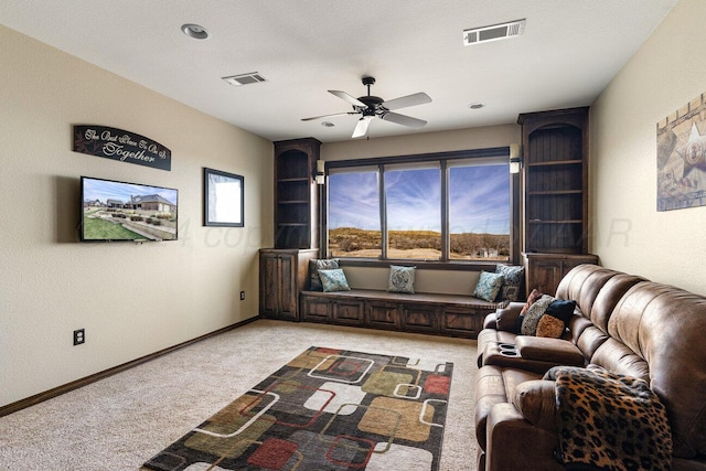 2501 Mackenzie Trl, Amarillo, TX 79124 - living area with visible vents, light carpet, baseboards, and ceiling fan