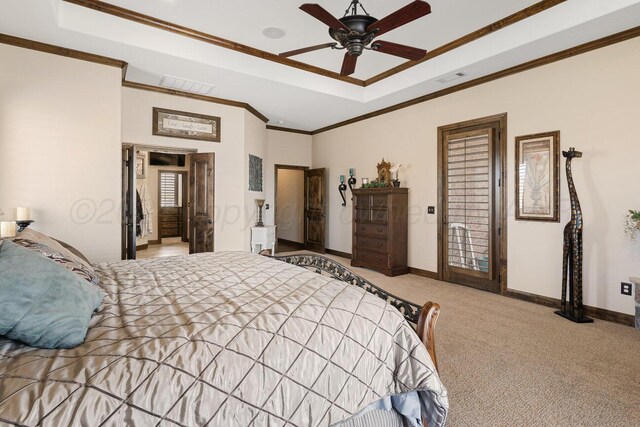 2501 Mackenzie Trl, Amarillo, TX 79124 - carpeted bedroom with a tray ceiling, baseboards, visible vents, and crown molding