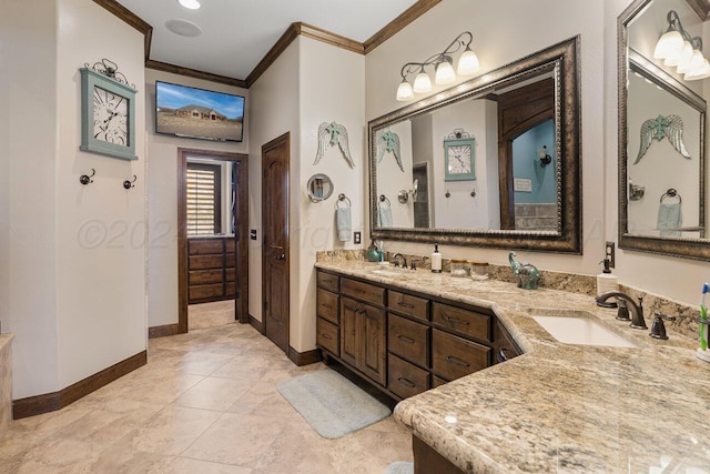 2501 Mackenzie Trl, Amarillo, TX 79124 - bathroom with double vanity, ornamental molding, baseboards, and a sink