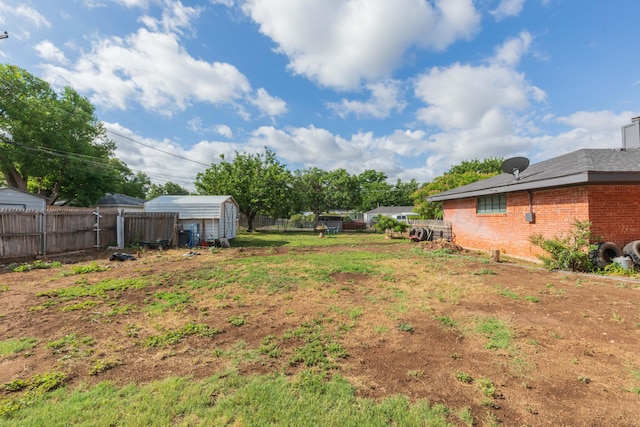 2041 S Travis St, Amarillo, TX 79109 - fenced backyard featuring a storage shed