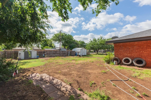 2041 S Travis St, Amarillo, TX 79109 - fenced backyard featuring a storage shed