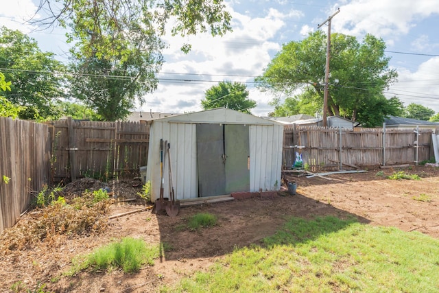 2041 S Travis St, Amarillo, TX 79109 - view of shed featuring a fenced backyard