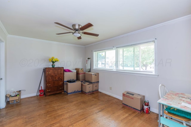 2041 S Travis St, Amarillo, TX 79109 - playroom featuring ornamental molding, light wood-style floors, and a ceiling fan