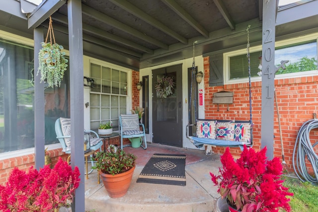 2041 S Travis St, Amarillo, TX 79109 - property entrance featuring covered porch and brick siding
