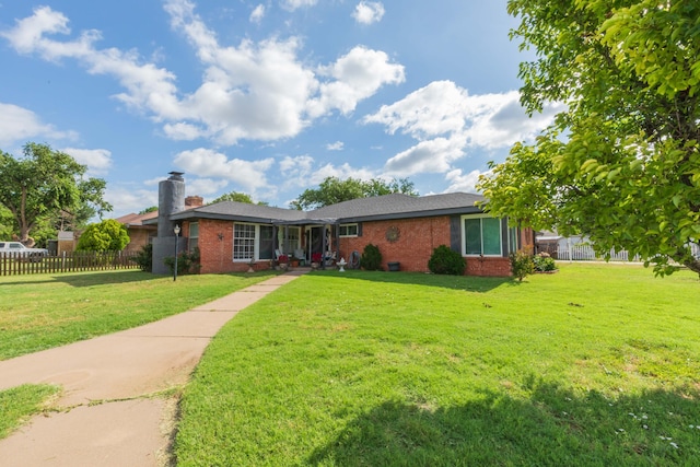 2041 S Travis St, Amarillo, TX 79109 - ranch-style home with brick siding and a chimney