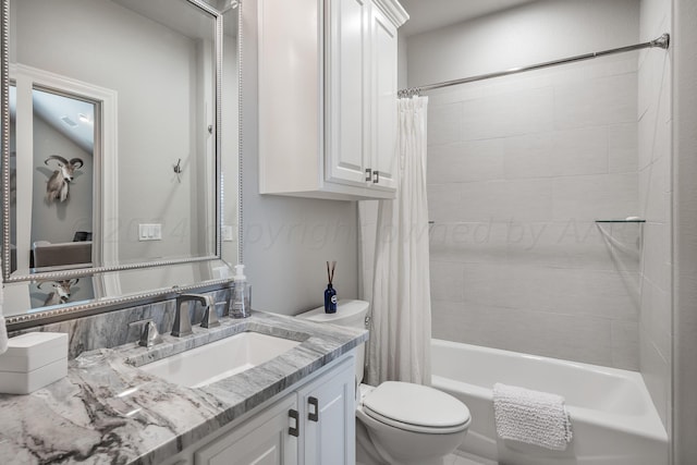 full bathroom featuring vanity, toilet, and shower / tub combo