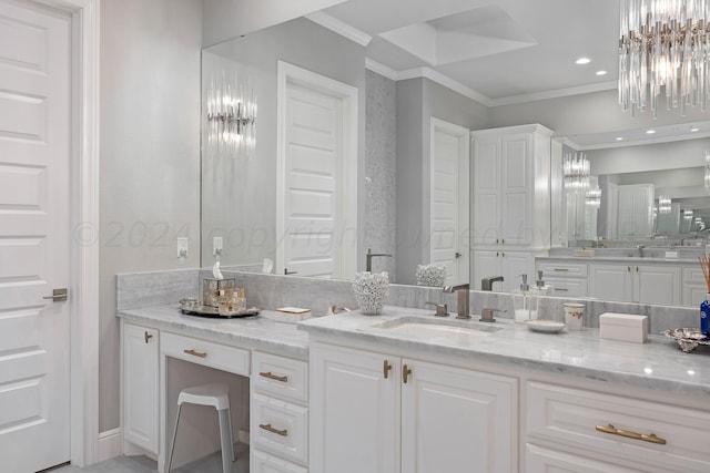 bathroom with vanity and ornamental molding