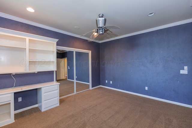 interior space with baseboards, carpet floors, and ornamental molding
