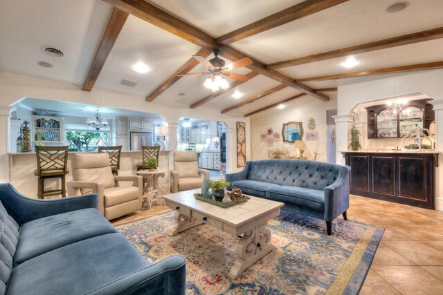 5200 Kingswood Cir, Amarillo, TX 79109 - living area with a chandelier, decorative columns, light tile patterned flooring, ceiling fan, and recessed lighting