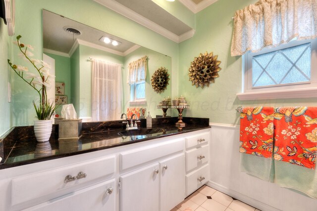 5200 Kingswood Cir, Amarillo, TX 79109 - bathroom featuring vanity, crown molding, and a wainscoted wall
