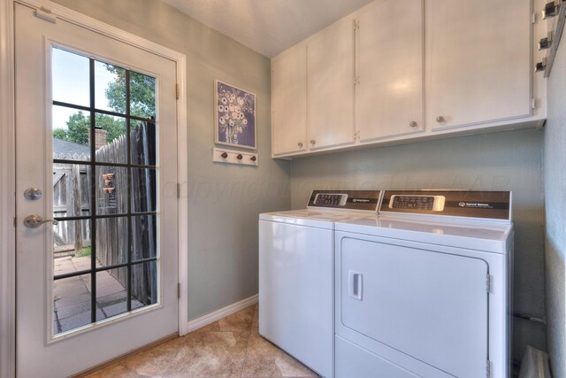 5200 Kingswood Cir, Amarillo, TX 79109 - washroom featuring cabinet space, separate washer and dryer, and light tile patterned floors