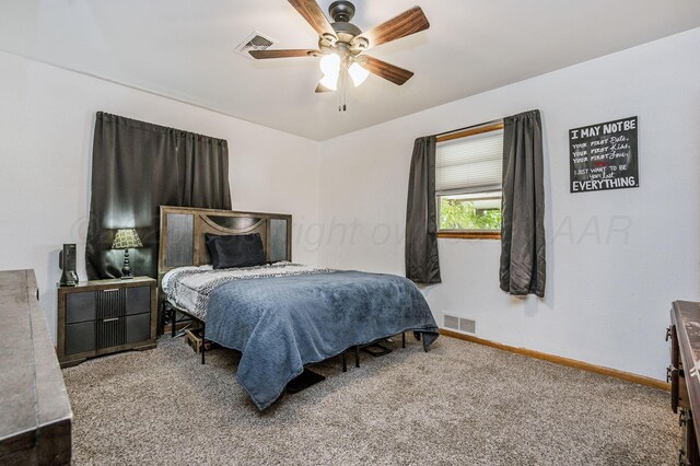 745 Fairlane St, Amarillo, TX 79108 - carpeted bedroom with baseboards and a ceiling fan