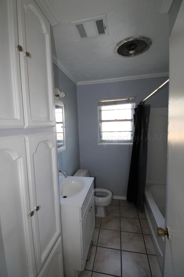 1035 Bagarry St, Amarillo, TX 79104 - bathroom featuring vanity, ornamental molding, shower / tub combo, and tile patterned flooring