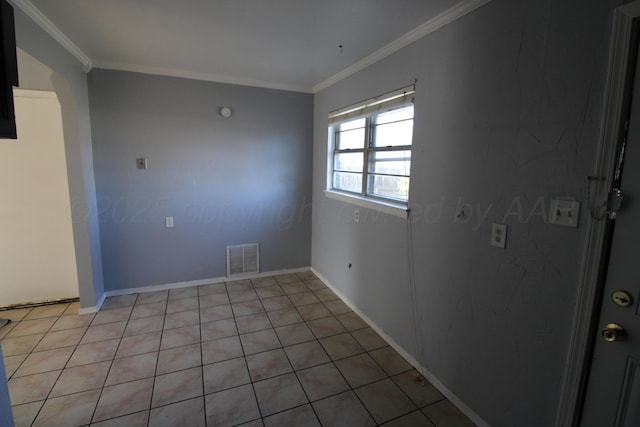 1035 Bagarry St, Amarillo, TX 79104 - unfurnished room with ornamental molding and light tile patterned flooring