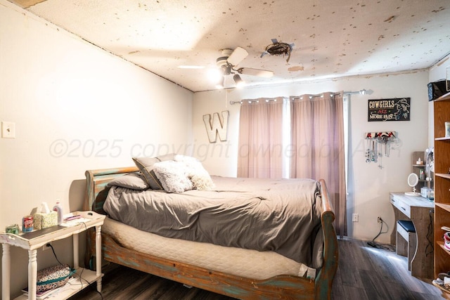 713 N Dwight St, Pampa, TX 79065 - bedroom with a ceiling fan and wood finished floors