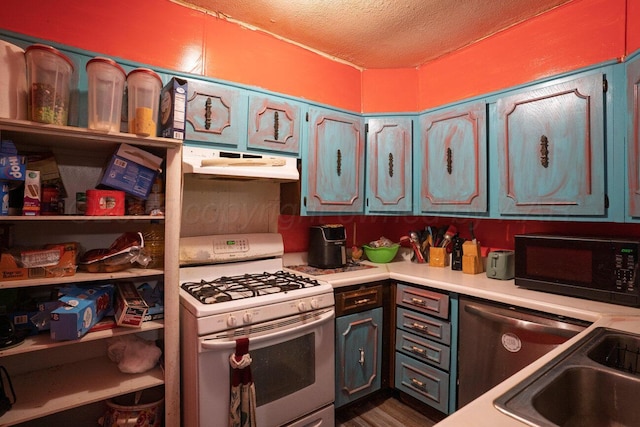 713 N Dwight St, Pampa, TX 79065 - kitchen with a textured ceiling, black microwave, dishwasher, white range with gas cooktop, and under cabinet range hood