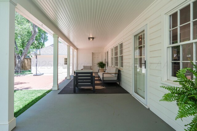 3220 S Travis St, Amarillo, TX 79109 - view of patio / terrace with an outbuilding