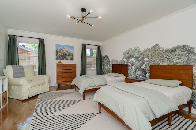 3220 S Travis St, Amarillo, TX 79109 - bedroom featuring a chandelier, wood finished floors, and crown molding
