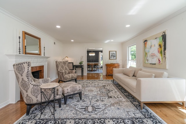 3220 S Travis St, Amarillo, TX 79109 - living area featuring wood finished floors, crown molding, recessed lighting, a fireplace, and baseboards