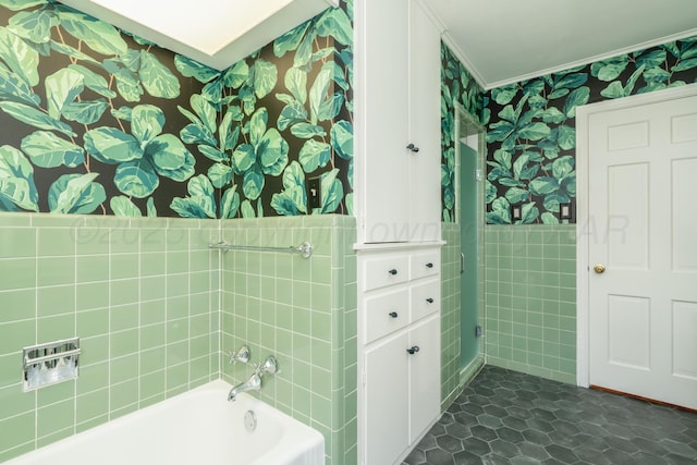 3220 S Travis St, Amarillo, TX 79109 - full bathroom with wallpapered walls, ornamental molding, tile walls, and tile patterned flooring