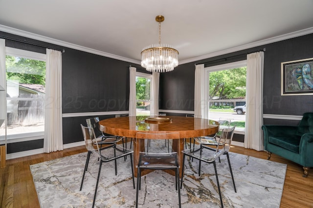 3220 S Travis St, Amarillo, TX 79109 - dining room with a chandelier, ornamental molding, wood finished floors, and baseboards