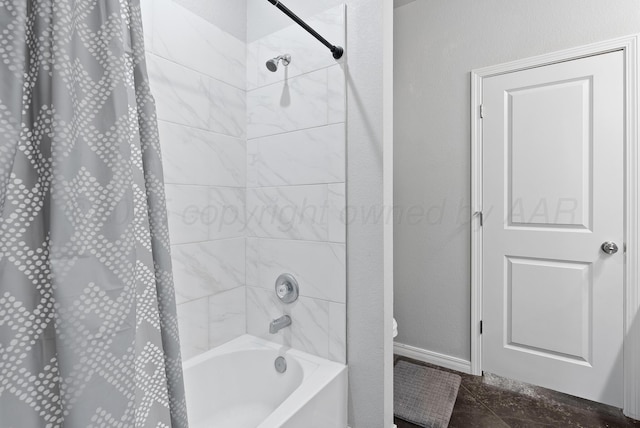 7400 Jake St, Amarillo, TX 79119 - bathroom with shower / bathtub combination with curtain and baseboards