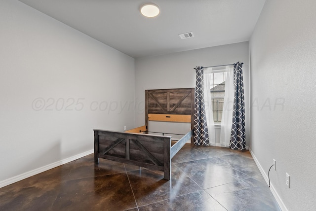 7400 Jake St, Amarillo, TX 79119 - unfurnished bedroom featuring concrete flooring and baseboards