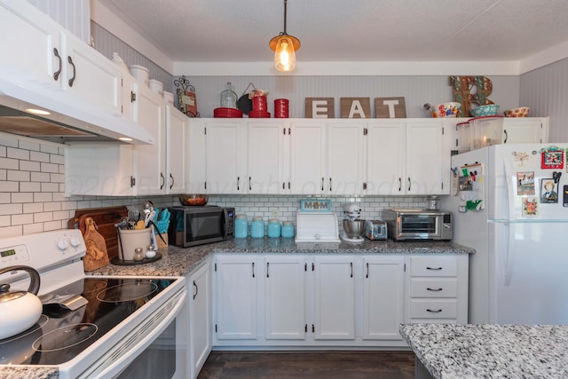 kitchen with under cabinet range hood, white appliances, white cabinetry, and a toaster