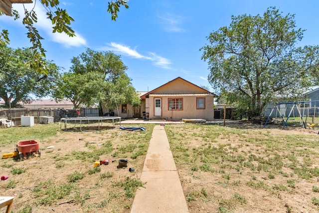 view of yard featuring a trampoline