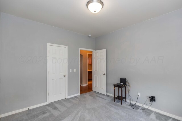 3508 Bismarck Ave, Amarillo, TX 79118 - empty room with carpet floors, baseboards, and a smoke detector