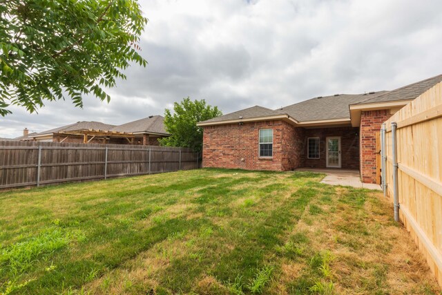 3508 Bismarck Ave, Amarillo, TX 79118 - view of yard with a patio